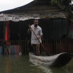 SENTANI, March 20, 2019 (Xinhua) -- A man rides a boat through flood water in Sentani, Papua province, Indonesia, March 19, 2019. Indonesian disaster authorities have put the death toll of flash floods and landslides in eastern province of Papua at 89 while the search and rescue operation for 74 missing persons continues, official said here on Tuesday. (Xinhua/Ikha/IANS) by .