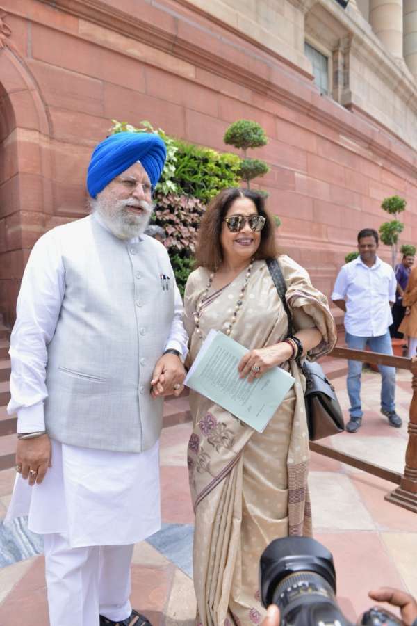 New Delhi: BJP MPs S. S. Ahluwalia and Kirron Kher at Parliament, in New Delhi on July 30, 2018. (Photo: IANS) by .