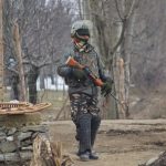 Kupwara: A soldier at the site of an encounter with militants in Jammu and Kashmir's Kupwara district on March 1, 2019. Two militants were killed in the gunfight. (Photo: IANS) by .