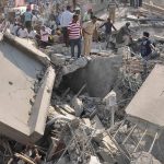 Dharwad: Rescue operations underway after an under construction multi-storey building collapsed leaving two people dead and 50 others trapped in Karnataka's Dharwad on March 19, 2019. (Photo: IANS) by .