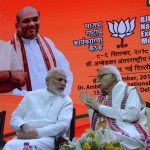 New Delhi: Prime Minister Narendra Modi interacts with BJP senior party leader LK Advani during BJP's National Executive meeting, in New Delhi on Sept 8, 2018. (Photo: IANS) by .