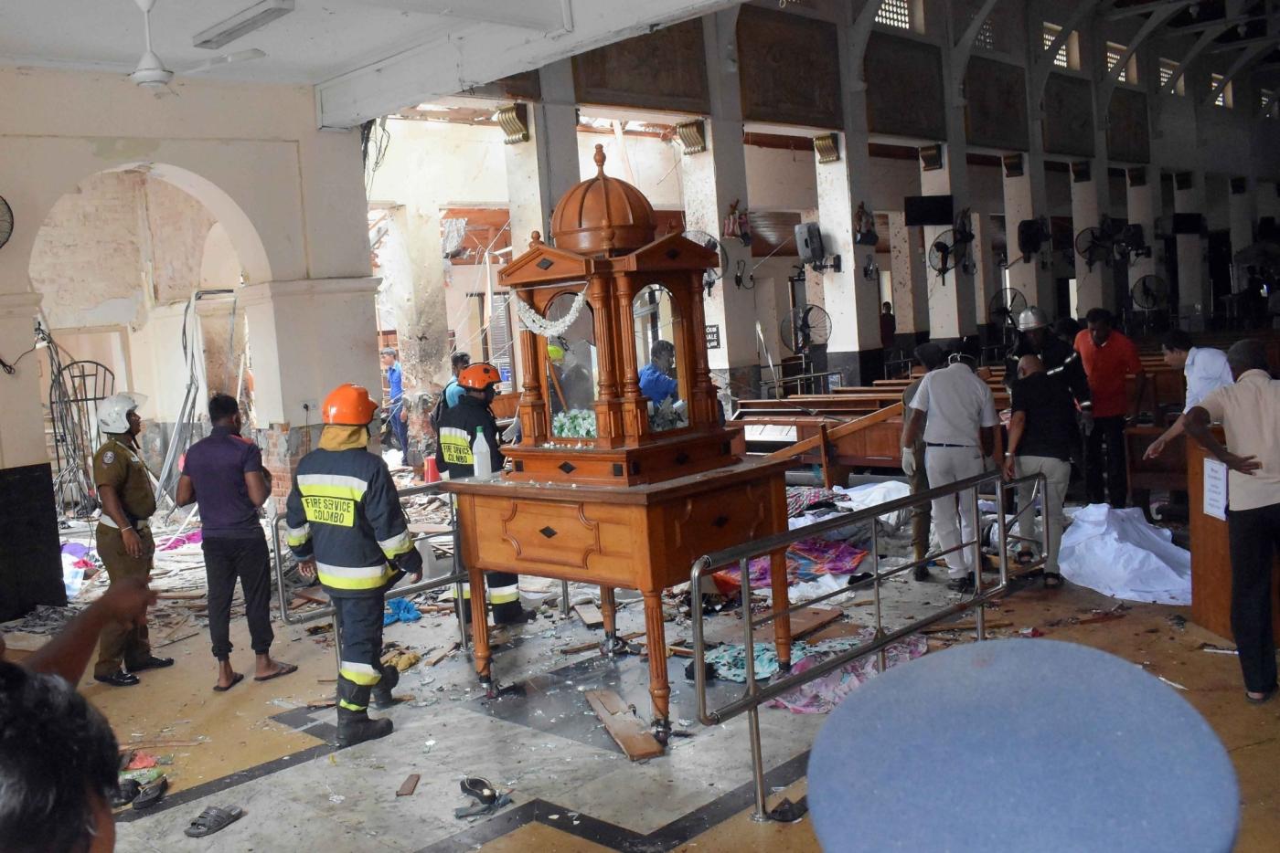 Colombo, April 22, 2019 (Xinhua) -- People work at a blast scene at St. Anthony's Church in Kochchikade in Colombo, Sri Lanka, April 21, 2019. The death toll from the multiple blasts that ripped through Sri Lanka on Sunday rose to 228 while 450 others were injured, local media quoting hospital sources said. (Xinhua/Wang Shen/IANS) by . 