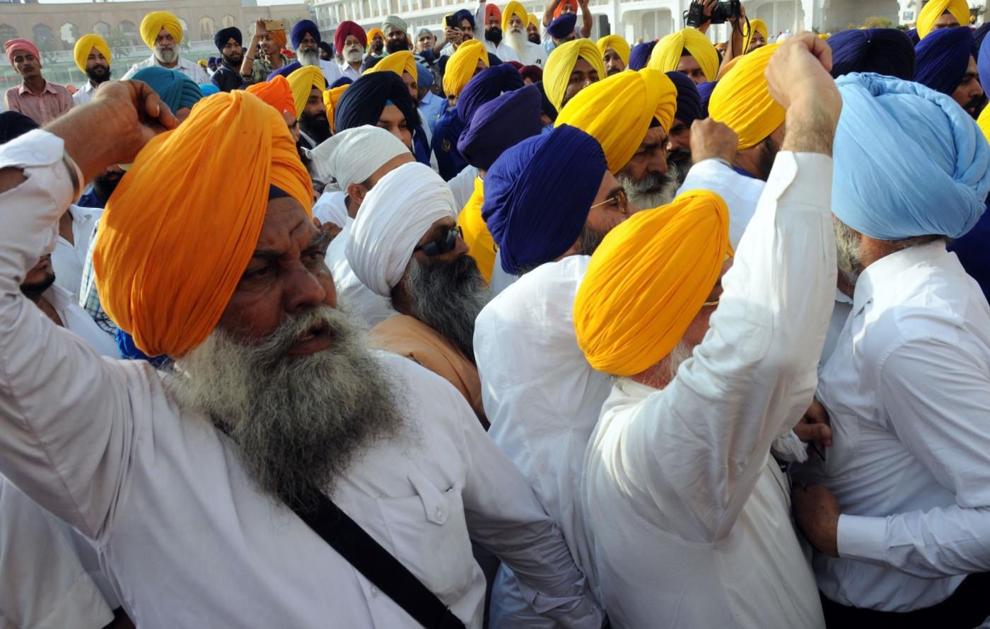 Amritsar: Sikh radicals shout pro-Khalistan slogans outside the venue of a programme organised by Shiromani Gurudwara Parbhandk Committee (SGPC) to felicitate Canadian Defence Minister Harjit Singh Sajjan in Amritsar on April 20, 2017. (Photo: IANS) by . 