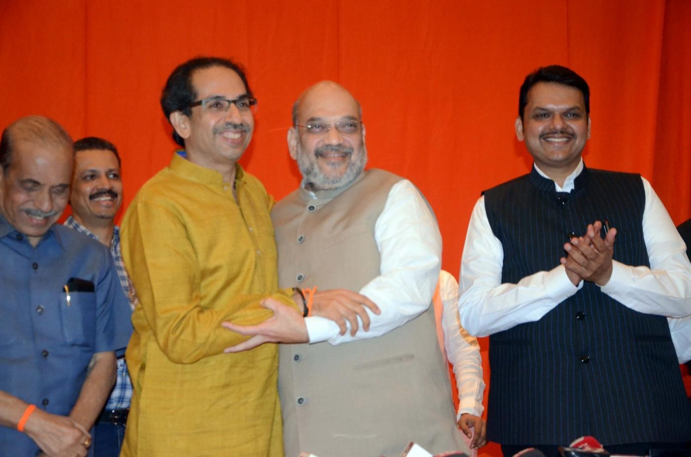 Mumbai: BJP President Amit Shah and Sena President Uddhav Thackeray, along with Maharashtra Chief Minister and BJP leader Devendra Fadnavis during a joint media briefing regarding BJP-Shiv Sena alliance for upcoming Lok Sabha and Maharashtra Assembly elections, in Mumbai on Feb 18, 2019. (Photo: IANS) by .