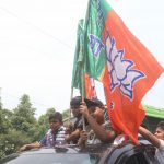 New Delhi: BJP supporters celebrate after the counting trends for the 2019 Lok Sabha elections show that the party appeared set to retain power as its candidates led in most of the 542 Lok Sabha constituencies, in New Delhi on May 23, 2019. (Photo: IANS) by .
