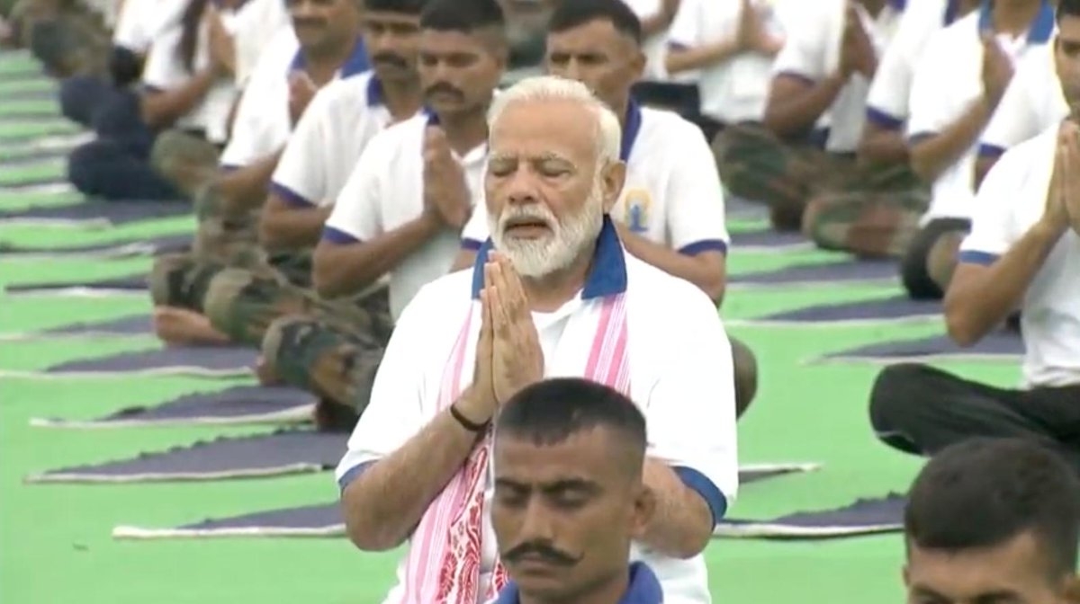 Ranchi: Prime Minister Narendra Modi practices yoga asanas -postures- on International Yoga Day 2019 at Prabhat Tara Maidan in Ranchi on June 21, 2019. (Photo: IANS) by .