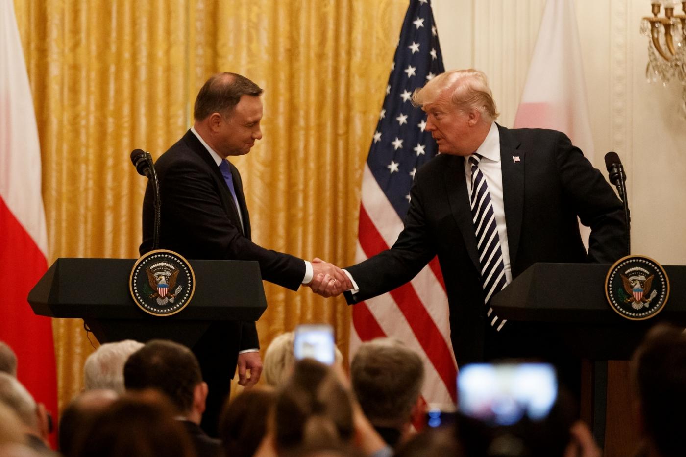 WASHINGTON D.C., Sept. 19, 2018 (Xinhua) -- U.S. President Donald Trump (R) and visiting Polish President Andrzej Duda attend a joint press conference at the White House in Washington D.C. Sept. 18, 2018. Donald Trump said on Tuesday that the U.S. was weighing the idea of establishing a permanent military base in Poland, a proposal raised by the visiting Polish leader. (Xinhua/Ting Shen/IANS) by . 