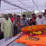 Jaipur: BJP workers pays tributes to state BJP chief Madan Lal Saini at the party state headquarters, in Jaipur on June 25, 2019. Saini, who was admitted at the All India Institute of Medical Sciences in New Delhi last week after a lung infection, died on Monday. He was 75. (Photo: IANS) by . 