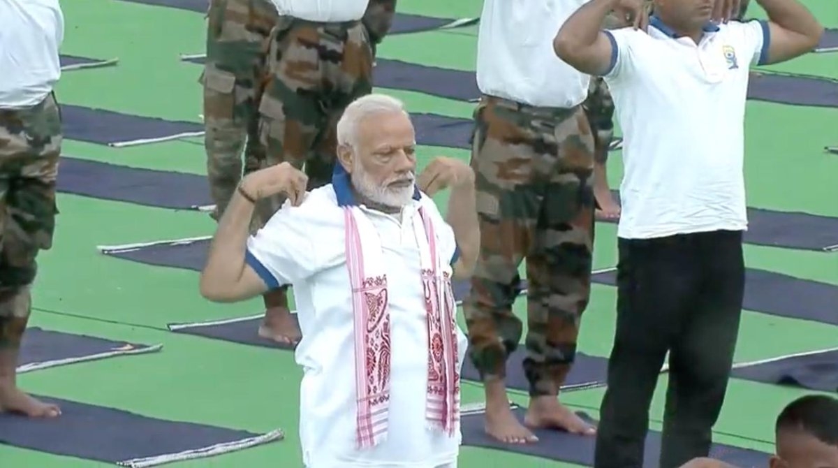 Ranchi: Prime Minister Narendra Modi practices yoga asanas -postures- on International Yoga Day 2019 at Prabhat Tara Maidan in Ranchi on June 21, 2019. (Photo: IANS) by . 