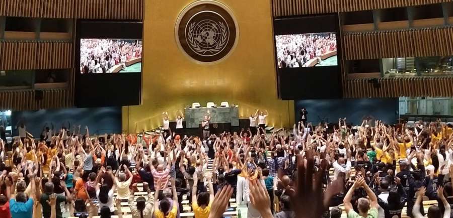 Yoga Guru Kevin Tobar of the Bhakti Centre leads a session of âoffice yogaâ at the United Nations General Assembly hall after rains forced the International Day of Yoga celebrations to move indoors. (Photo: Arul Louis/IANS) by .