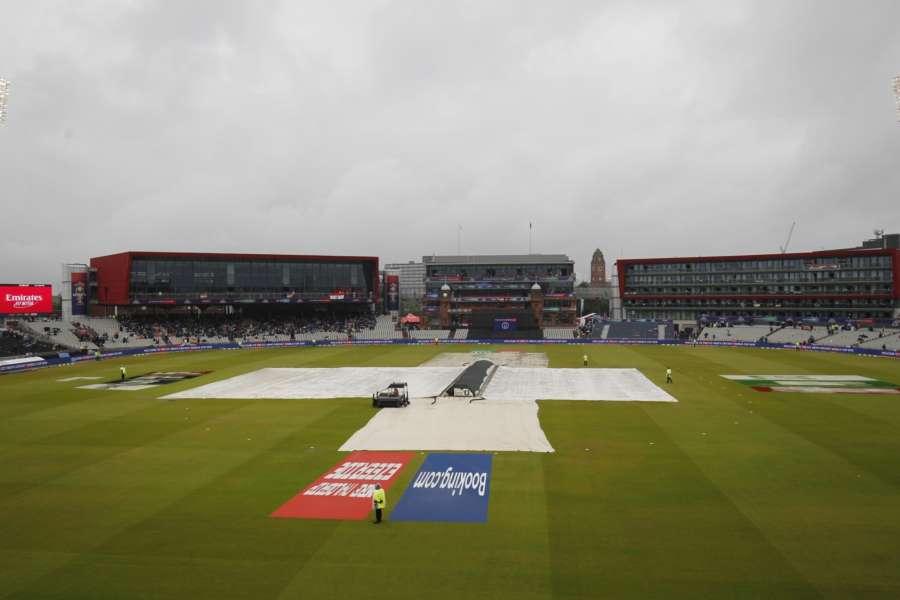 Manchester: A view of the pitch at Old Trafford covered with plastic sheets during rains that interrupted the 1st Semi-final match of 2019 World Cup between India and New Zealand in Manchester, England on July 9, 2019. (Photo: Surjeet Kumar/IANS) by . 