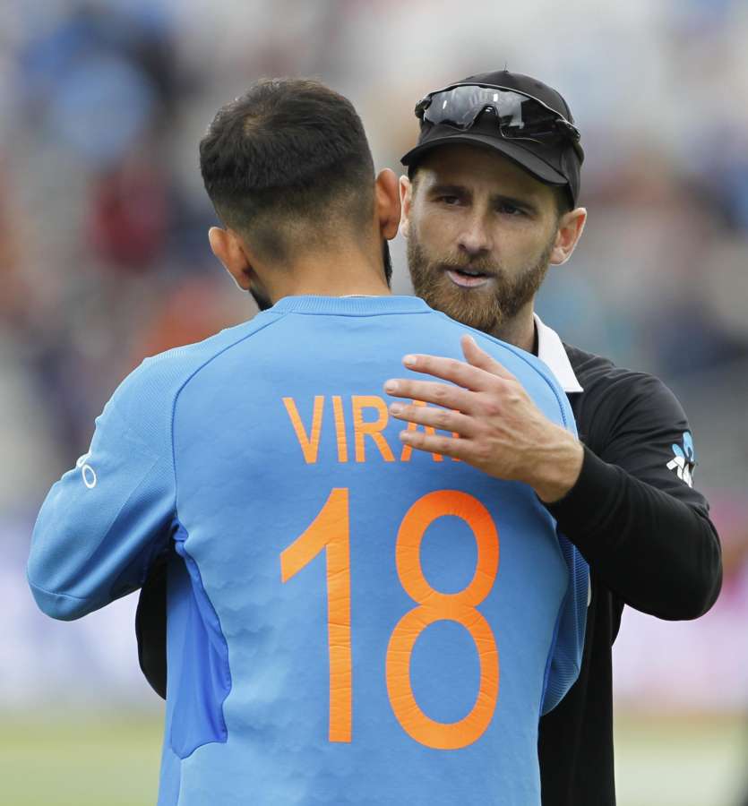 Manchester�: Indian skipper Virat Kohli congratulates New Zealand captain Kane Williamson after New Zealand won the 1st Semi-final match of 2019 World Cup against India at Old Trafford in Manchester, England on July 10, 2019. (Photo: Surjeet Kumar/IANS) by . 