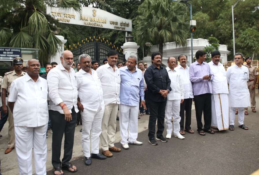 Bengaluru: Eight Congress and three Janata Dal-Secular (JD-S) legislators arrive at Raj Bhawan to submit their resignations to the Governor, in Bengaluru on July 6, 2019. (Photo: IANS) by . 