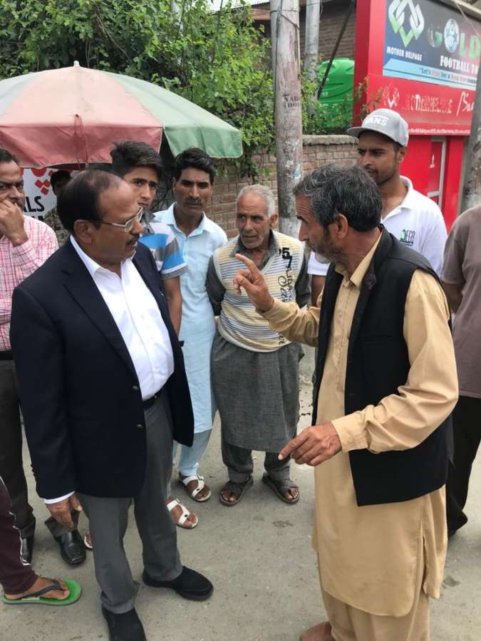Anantnag: National Security Advisor (NSA) Ajit Doval interacts with public in Anantnag, Jammu and Kashmir on Aug, 10 2019. (Photo: IANS) by .
