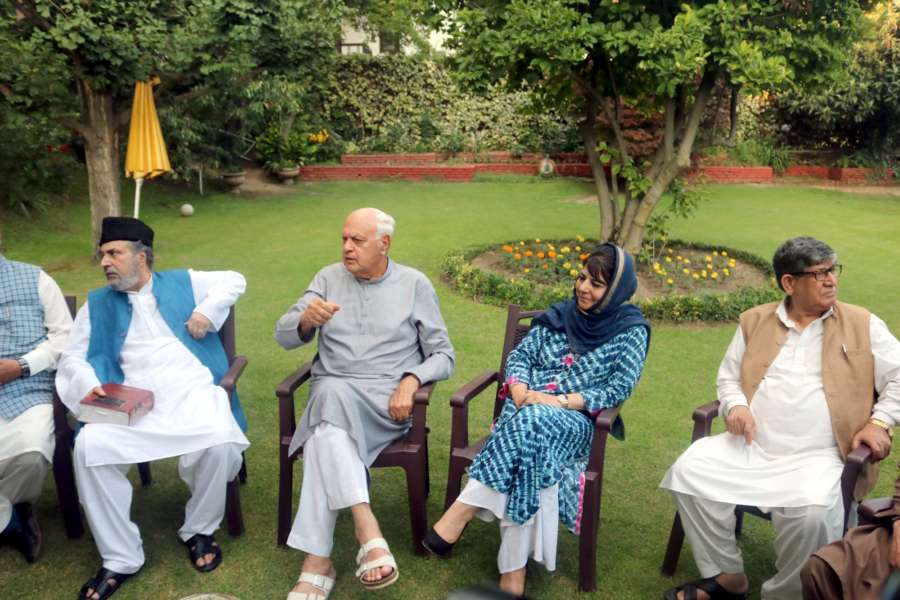 Srinagar: Peoples Democratic Party (PDP) leader Mehbooba Mufti and Nation Conference President Farooq Abdullah during All party meeting at Farooq Abdullah's residence in Srinagar on Aug 4, 2019. (Photo: IANS) by . 