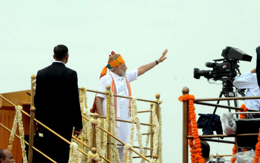 New Delhi: Prime Minister Narendra Modi waves at the crowd on the 73rd Independence Day from the ramparts of Red Fort, in New Delhi on Aug 15, 2019. (Photo: IANS) by . 