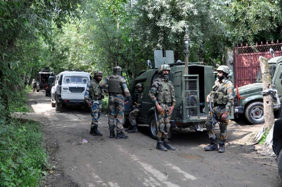 Shopian: Security personnel during search operations after two Army soldiers were killed in an encounter with militants at Pandushan village in South Kashmir's Shopian district, on Aug 2, 2019. (Photo: IANS) by . 