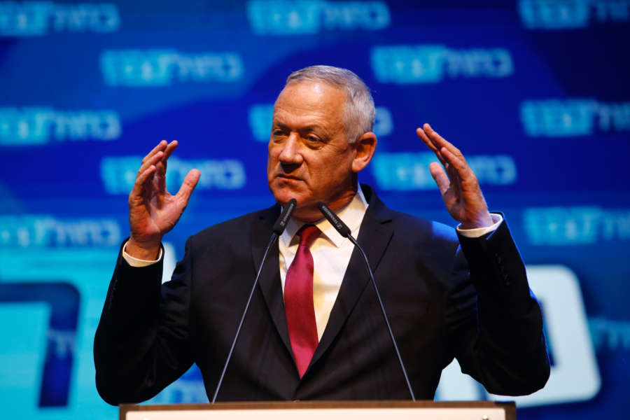 TEL AVIV, Sept. 18, 2019 (Xinhua) -- Blue and White party leader Benny Gantz gives a speech during a rally with supporters in Tel Aviv, Israel, Sept. 17, 2019. Israeli Prime Minister Benjamin Netanyahu's main challenger Benny Gantz said on Wednesday morning that it is too early to declare a victory in the country's parliamentary elections and called for a unity government. Initial exit polls posted by Israel's three main TV channels showed Gantz's centrist Blue and White party had a slight lead over Netanyahu's right-wing Likud party in Tuesday's vote, hurting Netanyahu's chances of winning a record-breaking fifth term. (Photo by Gil Cohen Magen/Xinhua/IANS) by guoyu. 