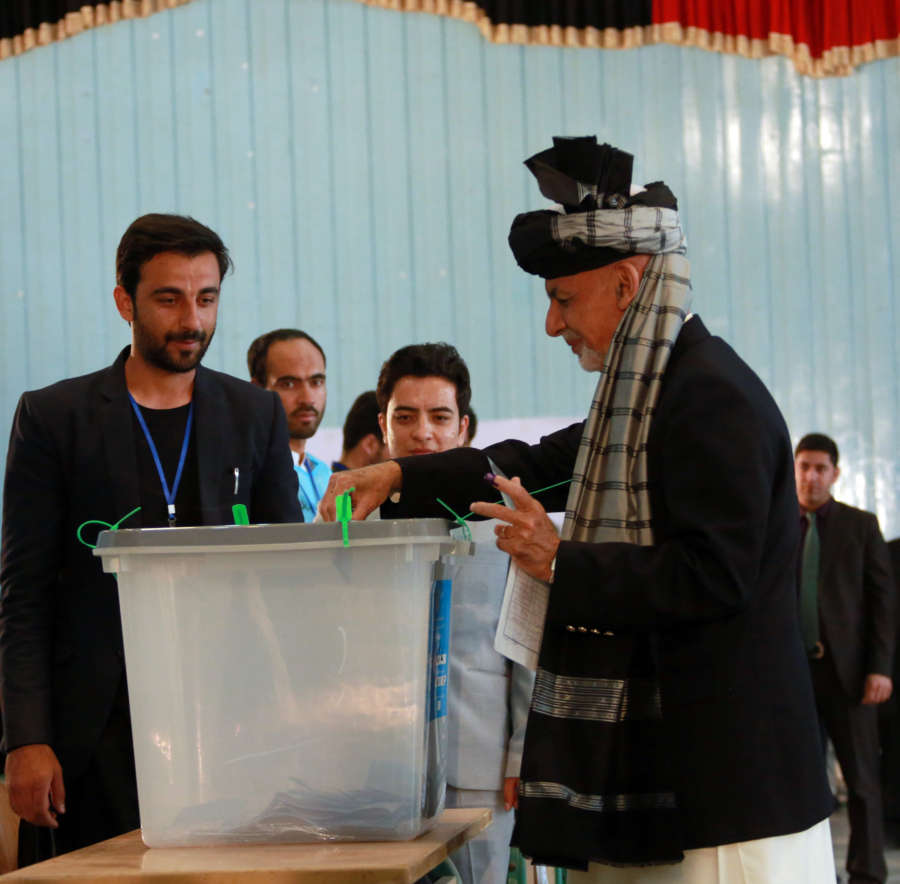 KABUL, Sept. 28, 2019 (Xinhua) -- Afghan President and presidential candidate Mohammad Ashraf Ghani (R) casts ballot at a polling center during presidential election in Kabul, capital of Afghanistan, Sept. 28, 2019. Afghanistan held presidential election on Saturday. (Xinhua/Rahmatullah Alizadah/IANS) by . 