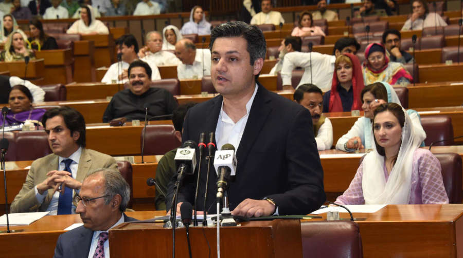 ISLAMABAD, June 11, 2019 (Xinhua) -- The photo released by Pakistan's Press Information Department (PID) on June 11, 2019 shows Pakistani Minister of Revenue Muhammad Hammad Azhar (front) presenting the federal budget for the fiscal year 2019-20 in Islamabad, capital of Pakistan. The Pakistani government on Tuesday proposed in its fresh budget to allocate 200 billion rupees (about 1.33 billion U.S. dollars) for the China-Pakistan Economic Corridor (CPEC) and relevant projects during the 2019-20 financial year starting July 1, 2019. (Xinhua/PID/IANS) by PID.