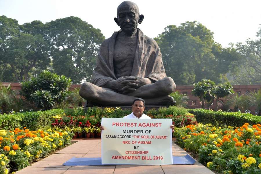 New Delhi: Assam Congress President Ripun Bora stages a sit-in demonstration against the introduction of the Citizenship Amendment Bill 2019 (CAB) claiming that the 'BJP will murder the Constitution and the Assam Accord', at Parliament in New Delhi on Dec 6, 2019. (Photo: IANS) by .