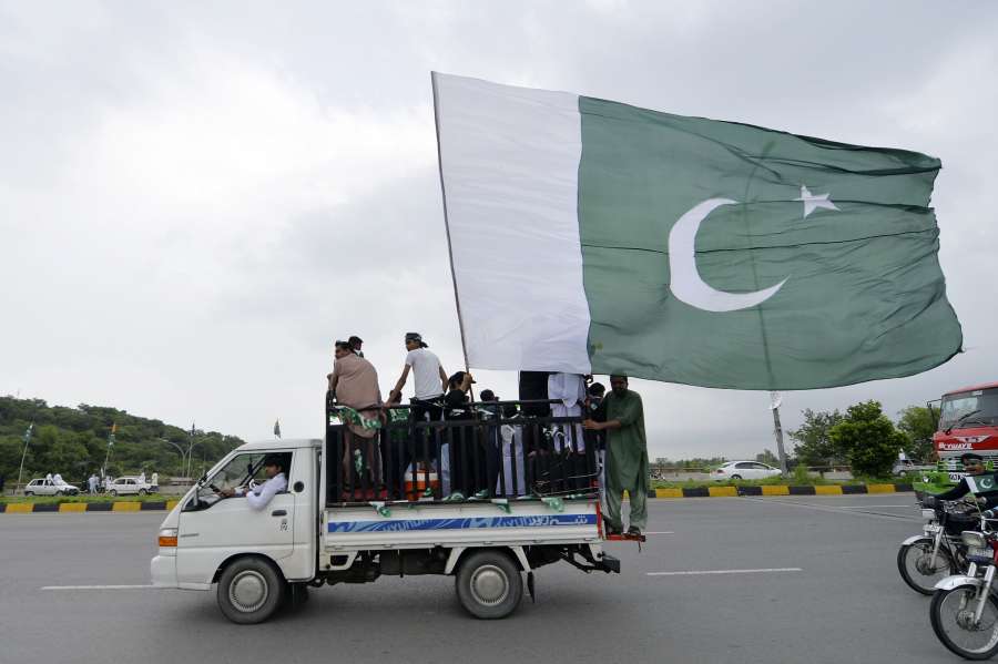 ISLAMABAD, Aug. 14, 2019 (Xinhua) -- A vehicle with Pakistan's national flag is seen on a street during the Independence Day celebrations in Islamabad, Pakistan, on Aug. 14, 2019. Pakistan got independence from the British colonial rule on Aug. 14, 1947. (Xinhua/Ahmad Kamal/IANS) by .