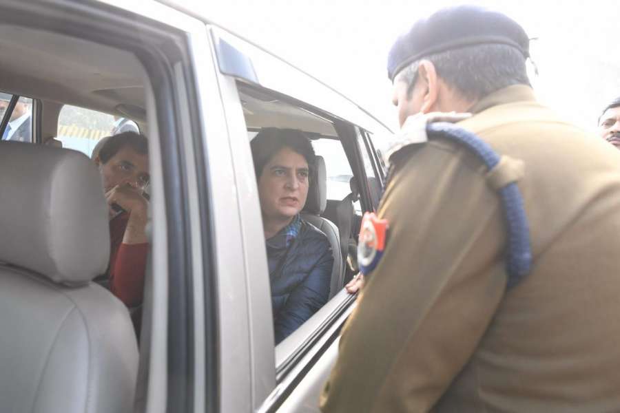 New Delhi: Congress leaders Rahul Gandhi and Priyanka Gandhi Vadra being stopped by a police personnel as they arrive to meet the victims of alleged police firing during the violent demonstrations against the Citizenship Amendment Act (CAA) and the National Register of Citizens (NRC) last week, in Uttar Pradesh's Meerut on Dec 24, 2019. (Photo: IANS) by .
