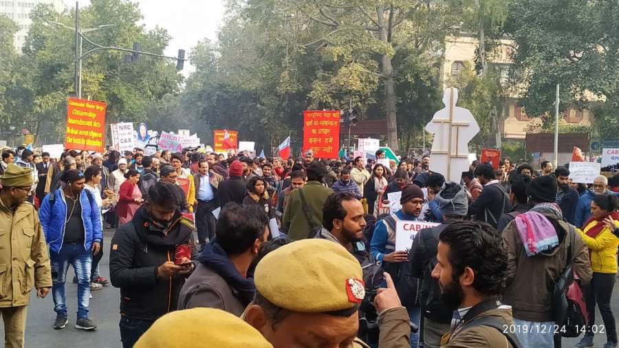 New Delhi: Despite prohibitory orders in place in the heart of the national capital, protesters gather in large numbers to protest against the Citizenship Amendment Act (CAA) 2019, amid tight security, at Mandi House in New Delhi on Dec 24, 2019. (Photo: IANS) by .