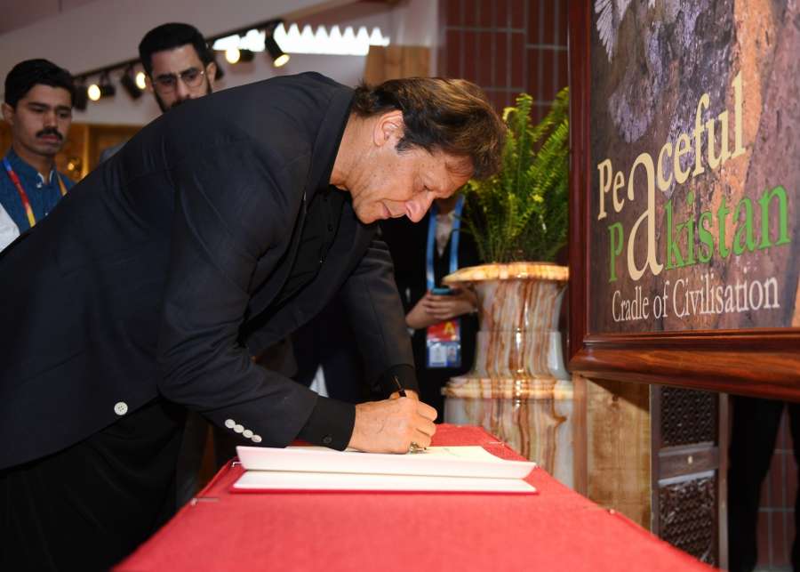 BEIJING, April 28, 2019 (Xinhua) -- Pakistani Prime Minister Imran Khan signs autograph as he visits the Pakistan Garden at the International Horticulture zone of the International Horticultural Exhibition 2019 Beijing, in Beijing, capital of China, April 28, 2019. (Xinhua/Zhang Chenlin/IANS) by . 