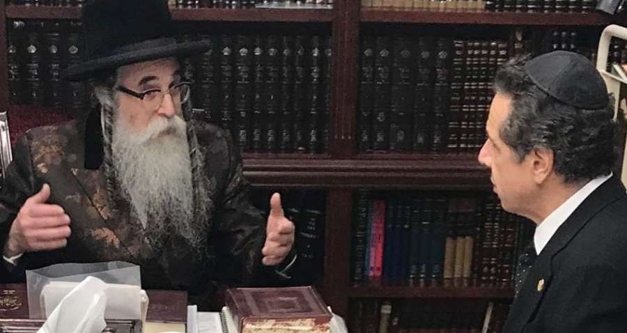 New York Governor Andrew Cuomo, right, listens on Sunday, Dec. 29, 2019, as a Jewish religious leader, Chaim Rottenberg, describes the attack by a knife-wielding assailant the previous night at his house in Ramapao, a New York suburb. (Photo: NY Gov./IANS) by .