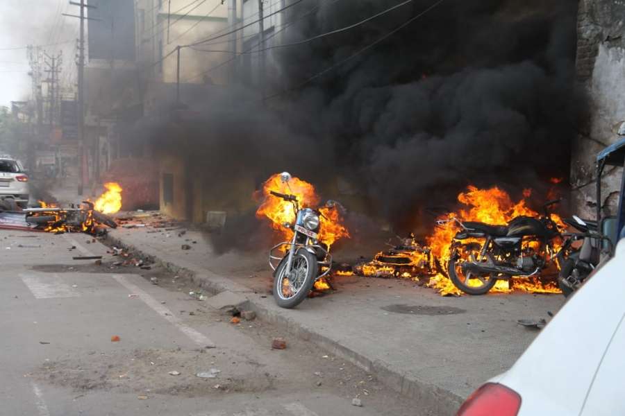 Lucknow: Angry protesters went on rampage and set ablaze vehicles during their protest against the Citizenship Amendment Act (CAA) 2019, in Lucknow on Dec 19, 2019. Violence erupted during protests against CAA on Thursday afternoon in various cities of Uttar Pradesh, including the state capital. Roadways buses were set on fire by protesters in Sambhal district and some private vehicles were also set ablaze. Internet services have been suspended in the western UP district. (Photo: IANS) by .