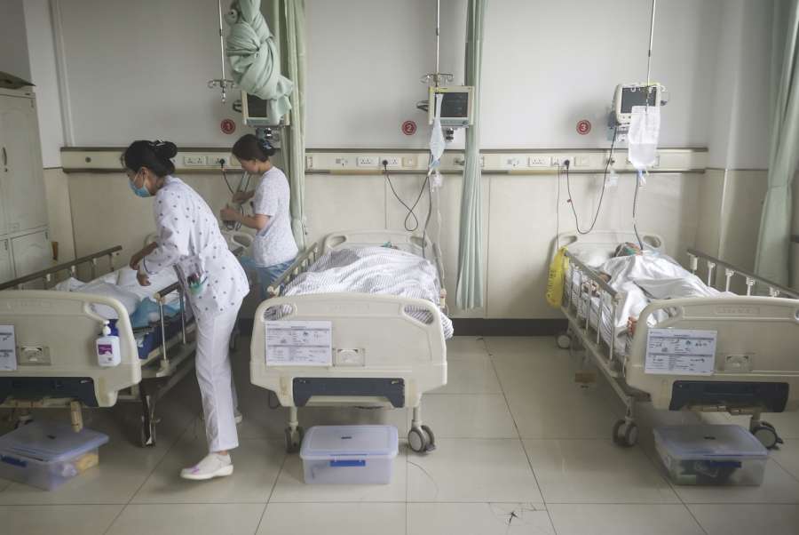 CHANGCHUN, June 10, 2019 (Xinhua) -- The paramedics treat the wounded at the First Hospital of Jilin University-the Eastern Division in Changchun, northeast China's Jilin Province, June 10, 2019. Nine people have been confirmed dead and 10 others injured following a rock burst late Sunday at a coal mine in Longjiapu, northeast China's Jilin Province. nThe burst occured at around 8:00 p.m. at Longjiapu coal mining company and caused an earthquake measuring 2.3 on the Richter scale, according to local authorities. (Xinhua/Xu Ziheng/IANS) by . 