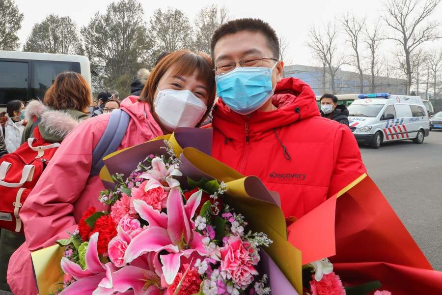 BEIJING, Jan. 26, 2020 (Xinhua) -- Ma Jun (L), a member of a medical team, says goodbye to her husband Chen Sen before leaving for Wuhan of Hubei Province at Beijing Capital International Airport in Beijing, capital of China, on Jan. 26, 2020. A 121-member medical team, organized by the National Health Commission, left Beijing for Wuhan Sunday afternoon to aid the coronavirus control efforts there. (Xinhua/Zhang Yuwei/IANS) by .