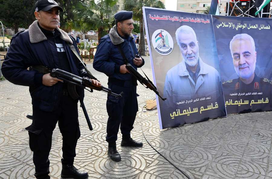 GAZA, Jan. 4, 2020 (Xinhua) -- Palestinian policemen stand guard next to pictures of senior Iranian commander Qasem Soleimani during a mourning ceremony held in Gaza City, Jan. 4, 2020. (Photo by Rizek Abdeljawad/Xinhua/IANS) by .