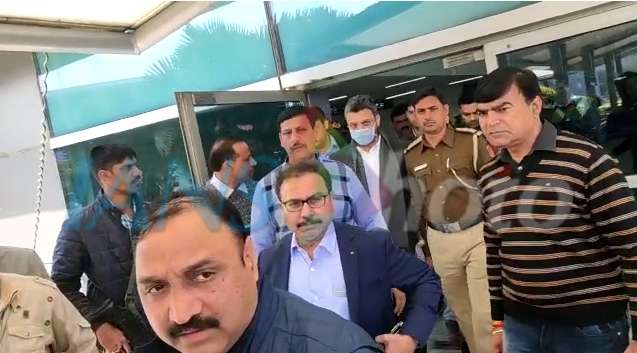New Delhi: Sanjeev Chawla, the alleged mastermind of match-fixing case being accompanied by a crime branch team from London arrives at Indira Gandhi International Airport on Feb 13, 2020. (Photo: Sanjeev Kumar Singh Chauhan/IANS) by . 
