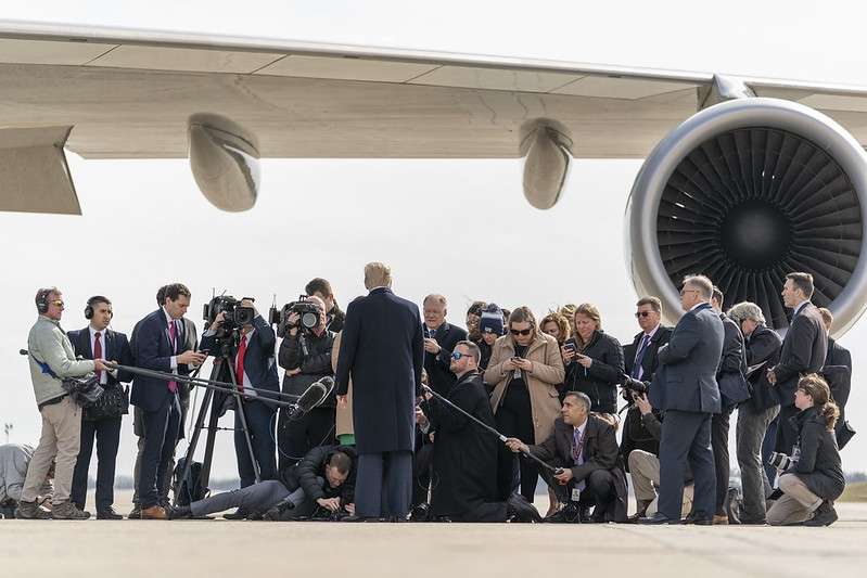 United States President Donald Trump talks to the media outside the Air Force One presidential plane at Joint Base Andrews in Maryland on Tuesday, February 18, 2020, about his forthcoming visit to India. (Photo: White House/IANS) by . 