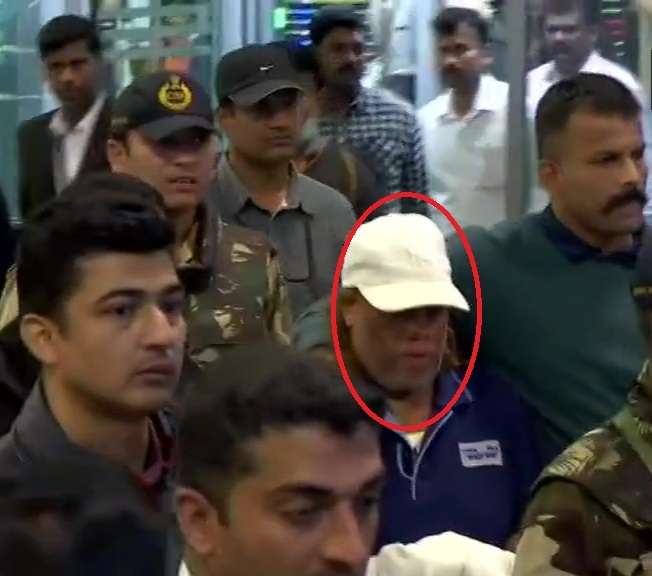 Bengaluru: Ravi Pujari (wearing white cap), accused of committing serious offences including murder and extortion, reaches Kempegowda International Airport. by . 