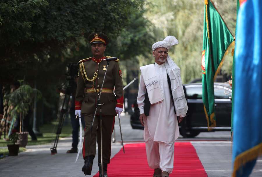 KABUL, Aug. 11, 2019 (Xinhua) -- Afghan President Mohammad Ashraf Ghani (R) reviews the guards of honor during an Eid al-Adha prayer at the Presidential Palace in Kabul, Afghanistan, Aug. 11, 2019. Afghan President Mohammad Ashraf Ghani on Sunday called for the end of war and the return of viable peace in his militancy-battered country. (Xinhua/Rahmatullah Alizadah/IANS) by . 
