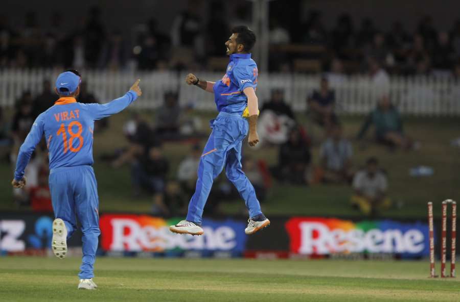 Mount Maunganui: India's Virat Kohli and Yuzvendra Chahal celebrate the wicket of Martin Guptill during the 3rd ODI between India and New Zealand at the Bay Oval in Mount Maunganui, New Zealand on Feb 11, 2020. (Photo: Surjeet Yadav/IANS) by . 