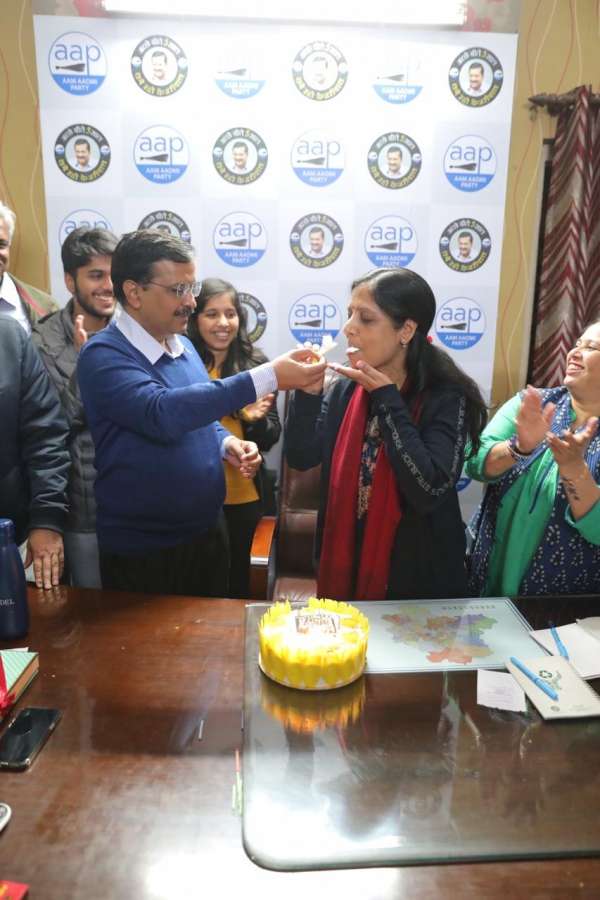 New Delhi: Delhi Chief Minister and Aam Aadmi Party (AAP) chief Arvind Kejriwal celebrates his wife Sunita Kejriwal's birthday amid counting of votes for the Delhi Assembly elections 2020, at the party's headquarters in New Delhi on Feb 11, 2020. (Photo: IANS) by . 