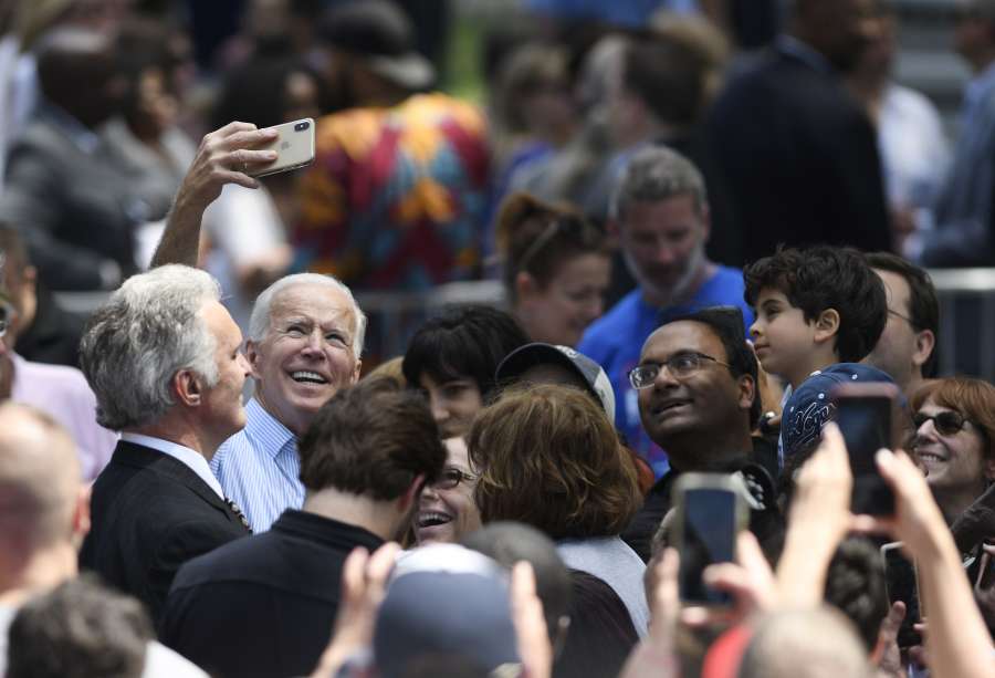 PHILADELPHIA, May 19, 2019 (Xinhua) -- Former U.S. Vice President Joe Biden takes selfie with supporters during a rally in Philadelphia May 18, 2019. Joe Biden on Saturday kicked off his running campaign for the 2020 presidential election in Philadelphia. (Xinhua/Liu Jie/IANS) by . 