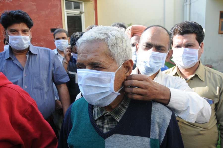 Amritsar: Factory workers wear masks before going to work, as a precautionary measure against the deadly Coronavirus, in Amritsar on March 8, 2020. (Photo: IANS) by . 