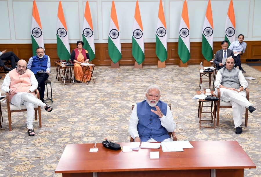 New Delhi: Prime Minister Narendra Modi holds video conference with the Chief Ministers of all the states to discuss measures against COVID-19, on Apr 2, 2020. Also seen Union Home Minister Amit Shah, Defence Minister Rajnath Singh, Cabinet Secretary Rajiv Gauba and other dignitaries. (Photo: IANS/PIB) by . 