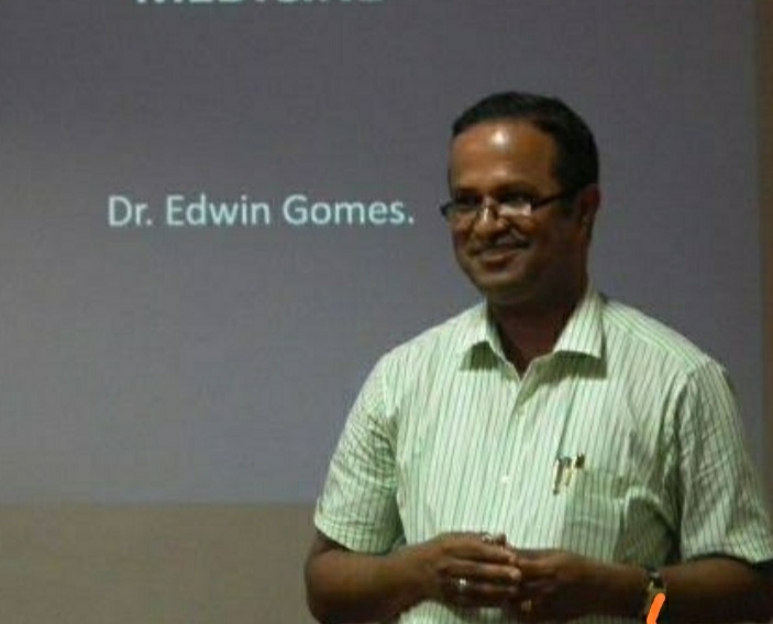 Dr. Edwin Gomes. by . 