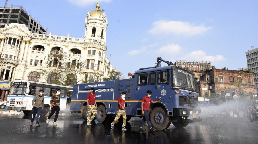 Kolkata Police uses water cannons to spray disinfectant onto roads to help combat the threat of COVID-19, during the nationwide lockdown imposed as a precautionary measure to contain coronavirus, that has now been extended till May 3; on Apr 14, 2020. (Photo: Kuntal Chakrabarty/IANS) by .