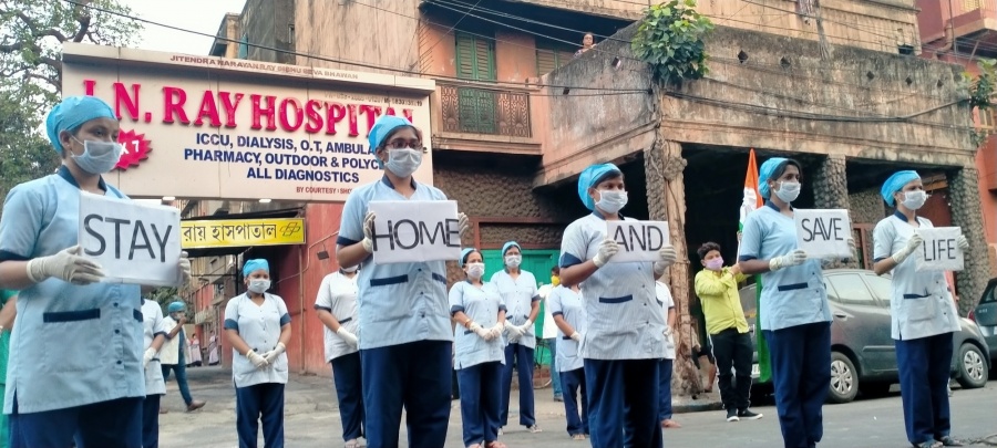 Kolkata: The medical staff at J N Ray Hospital participtes in an awareness campaign urging people to stay safe from COVID-19 by staying at home during the 21-day nationwide lockdown (that entered the 12th day) imposed as a precautionary measure to contain the spread of coronavirus, in Kolkata on Apr 5, 2020. (Photo: IANS) by . 