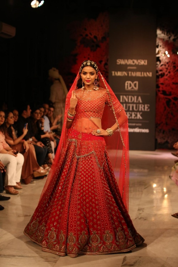 New Delhi: A model showcases fashion designer Tarun Tahiliani's creations at the India Couture Week 2019 in New Delhi, on July 28, 2019. (Photo: Amlan Paliwal/IANS) by . 