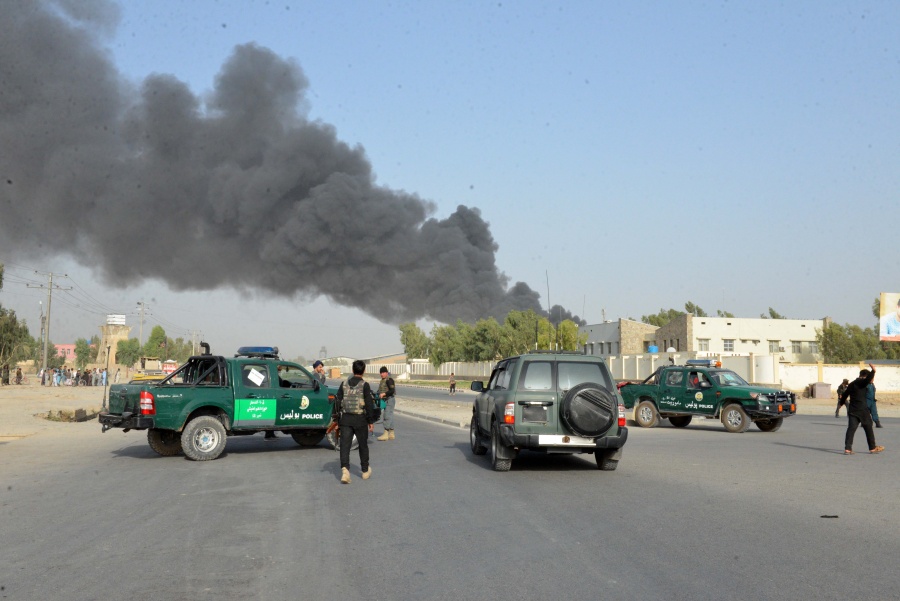 KANDAHAR, July 18, 2019 (Xinhua) -- Members of Afghan security forces stand guard at the site of the attack outside the provincial police headquarters in Kandahar, capital of Afghanistan's southern Kandahar province, July 18, 2019. At least 12 people were killed and over 90 others injured after a Taliban car bombing and ensuing gun fire rocked provincial police headquarters in Kandahar city, capital of Afghanistan's southern Kandahar province, on Thursday, witnesses said. (Xinhua/Sanaullah Seiam/IANS) by .