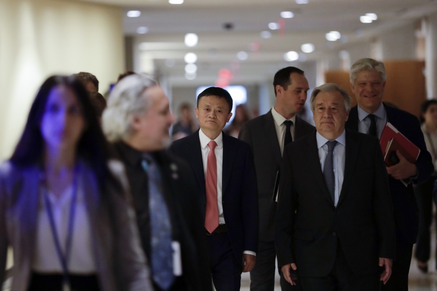 UNITED NATIONS, June 10, 2019 (Xinhua) -- Jack Ma (C) of China's Alibaba Group and United Nations Secretary-General Antonio Guterres (1st R, front) arrive to attend a high-level panel on digital cooperation at the UN Headquarters in New York, June 10, 2019. Jack Ma of China's Alibaba Group joined United Nations Secretary-General Antonio Guterres and Melinda Gates of the Gates Foundation in a live conversation here on Monday to discuss global digital cooperation for a safer and more sustainable future of the digital industry. (Xinhua/Li Muzi/IANS) by . 