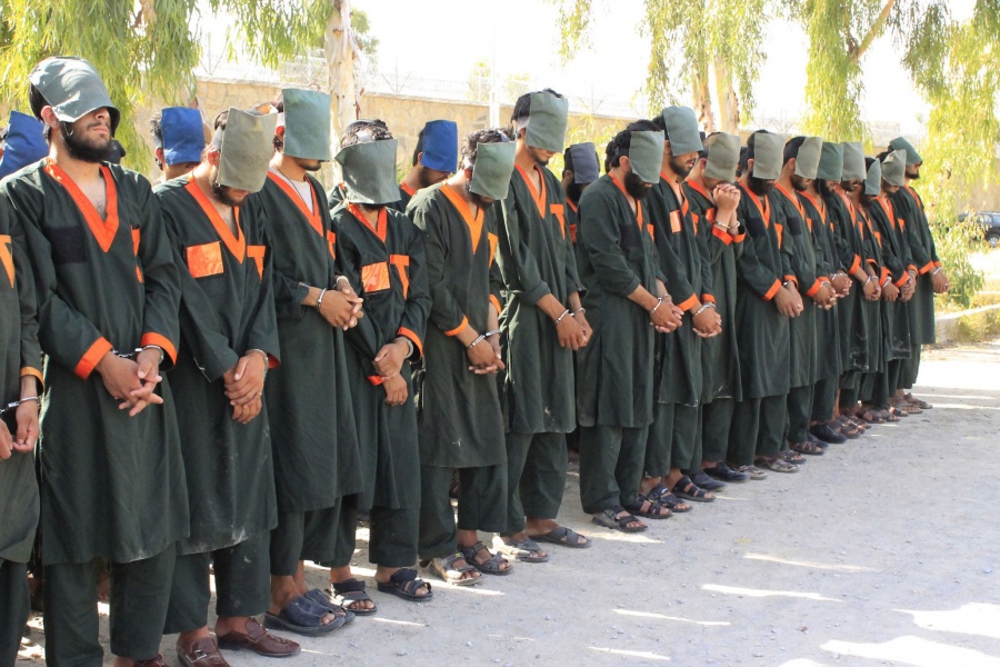 KANDAHAR, July 13, 2019 (Xinhua) -- Arrestees stand handcuffed in Kandahar province, Afghanistan, July 13, 2019. The Afghan government security forces have arrested 40 militants affiliated to Taliban militant group in southern Kandahar province, a provincial governor said Saturday. (Xinhua/Arghand/IANS) by . 